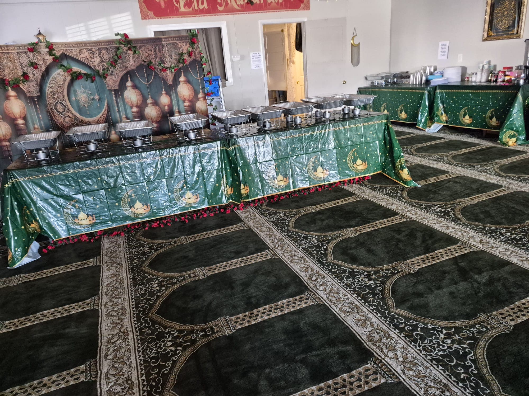 Community meal setup in the prayer hall at the Islamic Center of Lynchburg